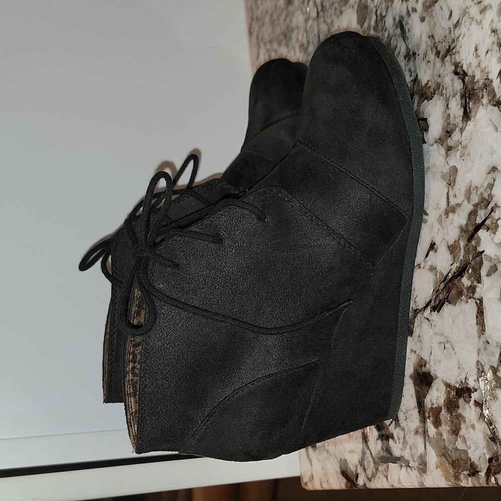Black wedge booties
